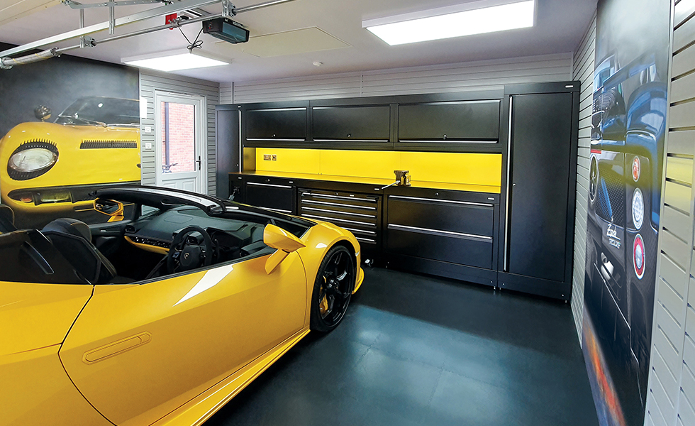 Themed garage with Dura cabinets and wall art for Lamborghini owner