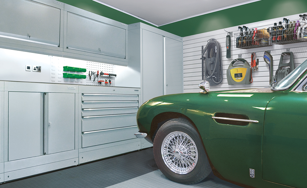 Aston Martin classic car garage with Dura cabinets, wall storage and flooring