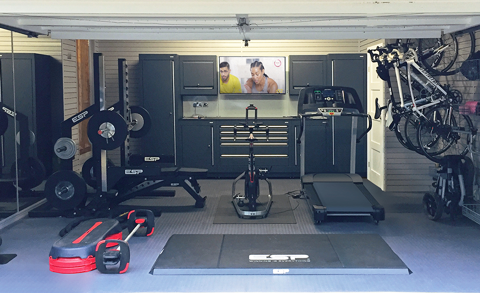 Dura cabinets, wall storage and flooring for an exercise garage