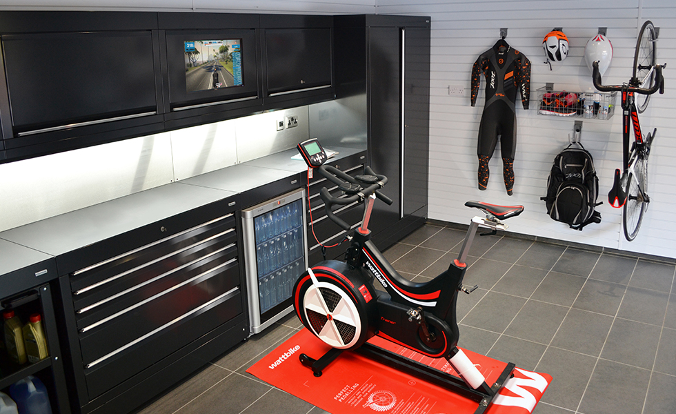 Dura cabinets and wall storage for a triathlon garage